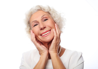 Close up portrait of happy senior woman smiling