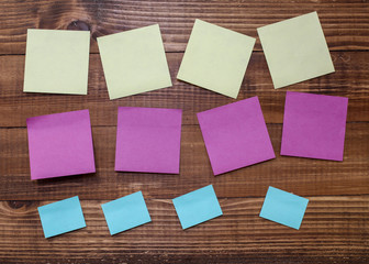 Wooden board with colored note stickers