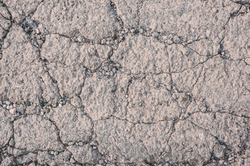 Light pink background of textured concrete with cracks. Concrete backdrop for post, screensaver, wallpaper, postcard, poster, banner, cover, header for website. High quality photo