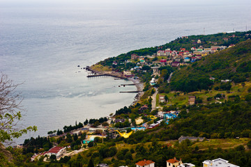 Fototapeta na wymiar top view of a small town along the coast