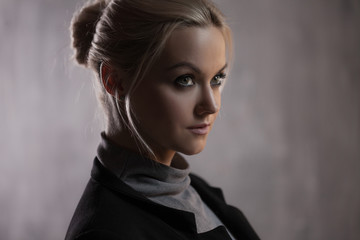 Portrait of beautiful blonde woman. Calm and self-confidence. Beautiful adult girl in black turtleneck