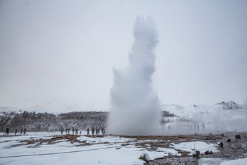 Strokkur erupts in Iceland's winter