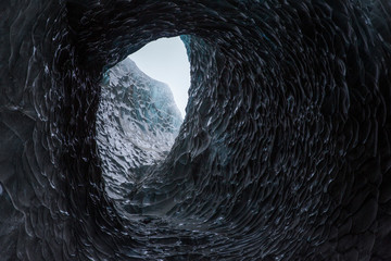Tunnel of ice in Vatnajokull, Iceland