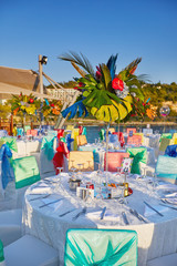 Fototapeta premium Festive served sea view terrace restaurant for corporate banquet or wedding