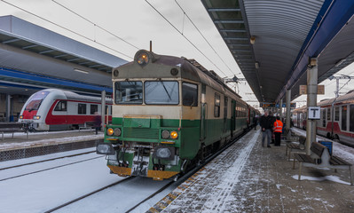 Presov station in winter snow morning with trains and platforms