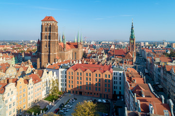 Fototapeta na wymiar Gdansk, Poland. Old city with St Mary church, town hall tower, Dluga (Long) Street, and old historic houses. Aerial view in sunset light