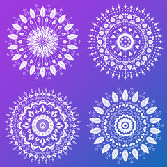 floral mandala set. Four round ornamental flowers on gradient violet background.