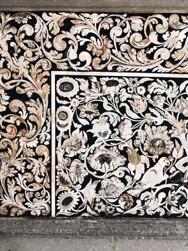 Ornate mural on a concrete wall