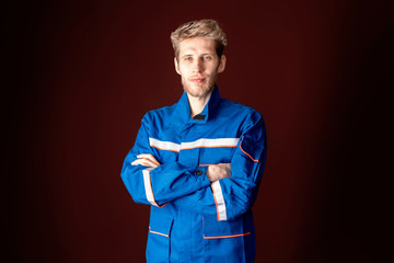 male worker in blue uniform isolated b