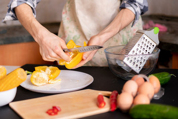 the process of cooking yellow fresh bell pepper b
