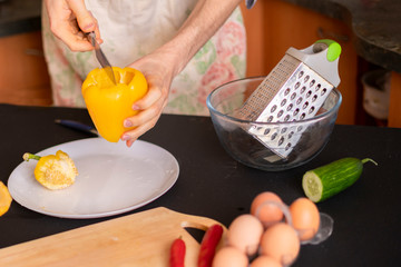 the process of cooking yellow fresh bell pepper b