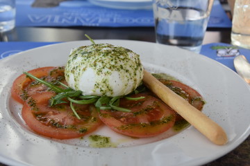 Tomato mozzarella as a light  vegetarian lunch.