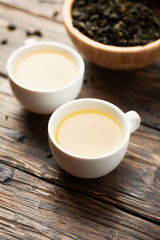 Two cups with hot green tea