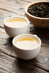 Two cups with hot green tea