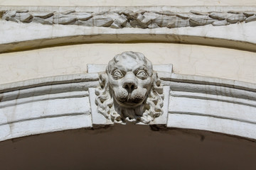 sculpture of a lion guarding above a gate in Vilnius, Lithuania