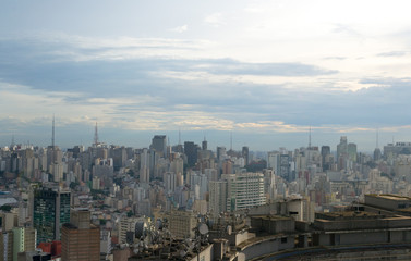 Naklejka na ściany i meble Aerial view of Sao Paulo in Brazil, downtown district seen from the top of one of the highest building of this city