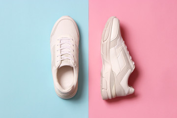 women's sneakers on a colored background top view. Women's shoes.