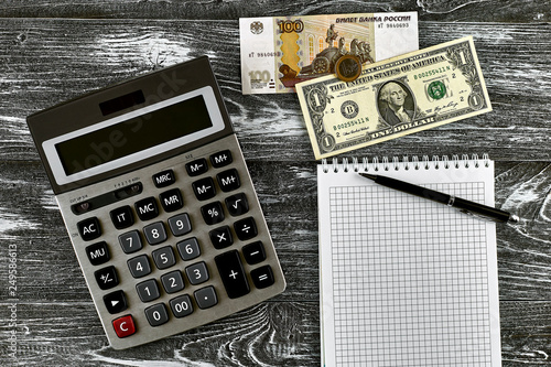 Calculator Notebook Pen And Money Exchange Rates Stock Photo Calculator Notebook Pen And Money Exchange Rates