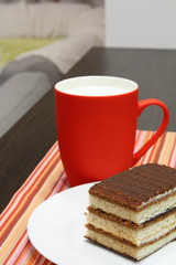 Tiramisu Sponge Cake with a Cup of Milk