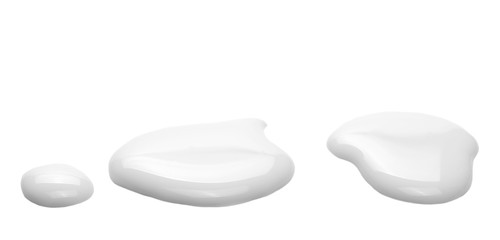 Spilled milk puddle isolated on white background and texture