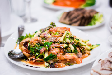food table dish dish salad vegetables meat