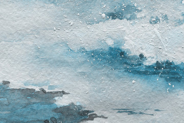 Blue watercolor texture with abstract washes and brush strokes on the white paper background.