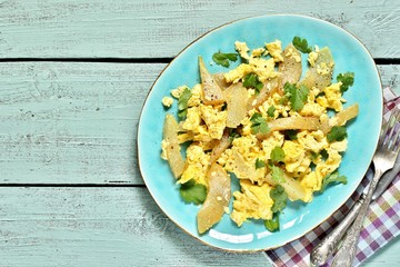 scrambled eggs with chayote. copy space. place for text. top view