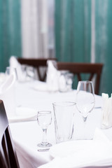 dinner table for dinner and breakfast plate glass glass spoon spoon tablecloth and tableware