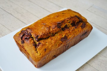 A homemade vegan chocolate banana bread with walnuts