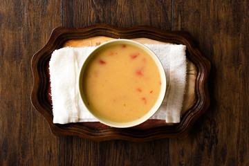Homemade Potato Pumpkin Soup served with Bread.