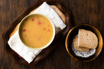 Homemade Potato Pumpkin Soup served with Bread.