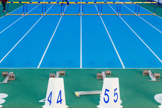 Sprint start line with blocks on track and field