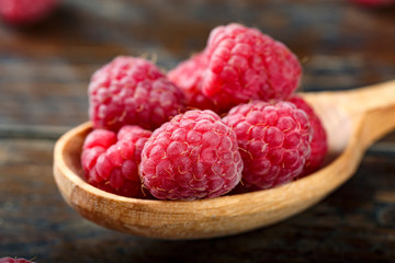fresh raspberries in a spoon