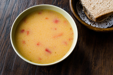 Homemade Potato Pumpkin Soup served with Bread.