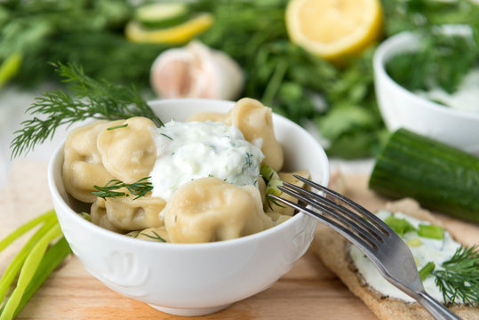 Boiled Dumplings With Greens In A Plate