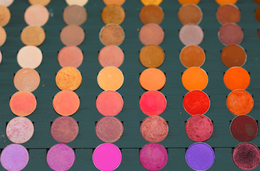 Colorful display palette of round make-up 