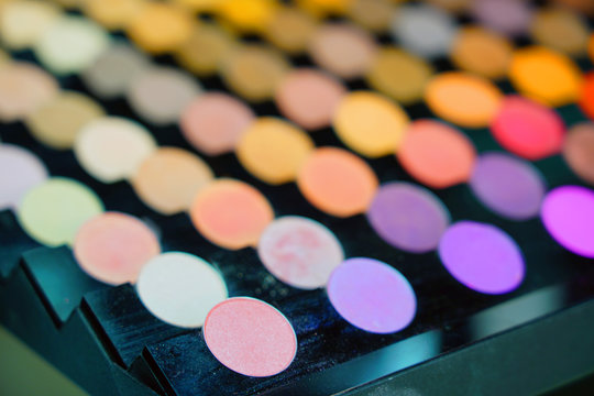Colorful display palette of round make-up 