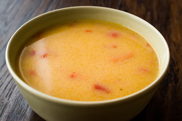 Homemade Potato Pumpkin Soup served with Bread.