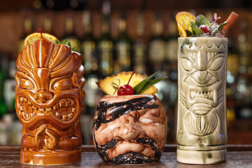 three tropical of cocktails on the bar
