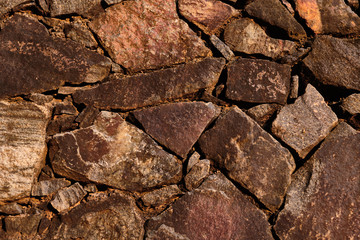 Texture of the old stone wall closeup.