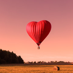 Red heart shaped air ballon, trendy color coral toned