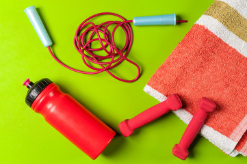fitness set with jump rope and dumbbell