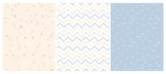 Set of 3 Bright Delicate Chevron, Hearts and Dots Vector Patterns. Irregular Tiny Dots Pattern. Hand Drawn Chevron Designs. White, Yellow, Beige and Blue Pastel Design. Cute Nursery Art Patterns.