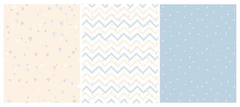Set of 3 Bright Delicate Chevron, Hearts and Dots Vector Patterns. Irregular Tiny Dots Pattern. Hand Drawn Chevron Designs. White, Yellow, Beige and Blue Pastel Design. Cute Nursery Art Patterns.