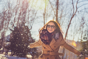 Fototapeta premium Pretty girl in winter park