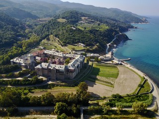 Mount Athos. Agion Oros. Sea view summer day aerial photo monastery Iviron and green landscape.
