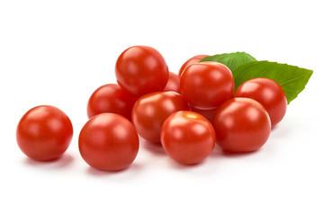 Fresh cherry tomatoes with basil, close-up, isolated on white background
