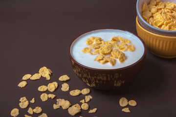 Bowl with flakes in homemade greek yogurt. Healthy food. Breakfast