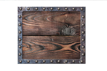 Vintage wooden signboard in rusty metal frame on rivets