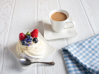 View to the sweet cake with coffee on the table. 